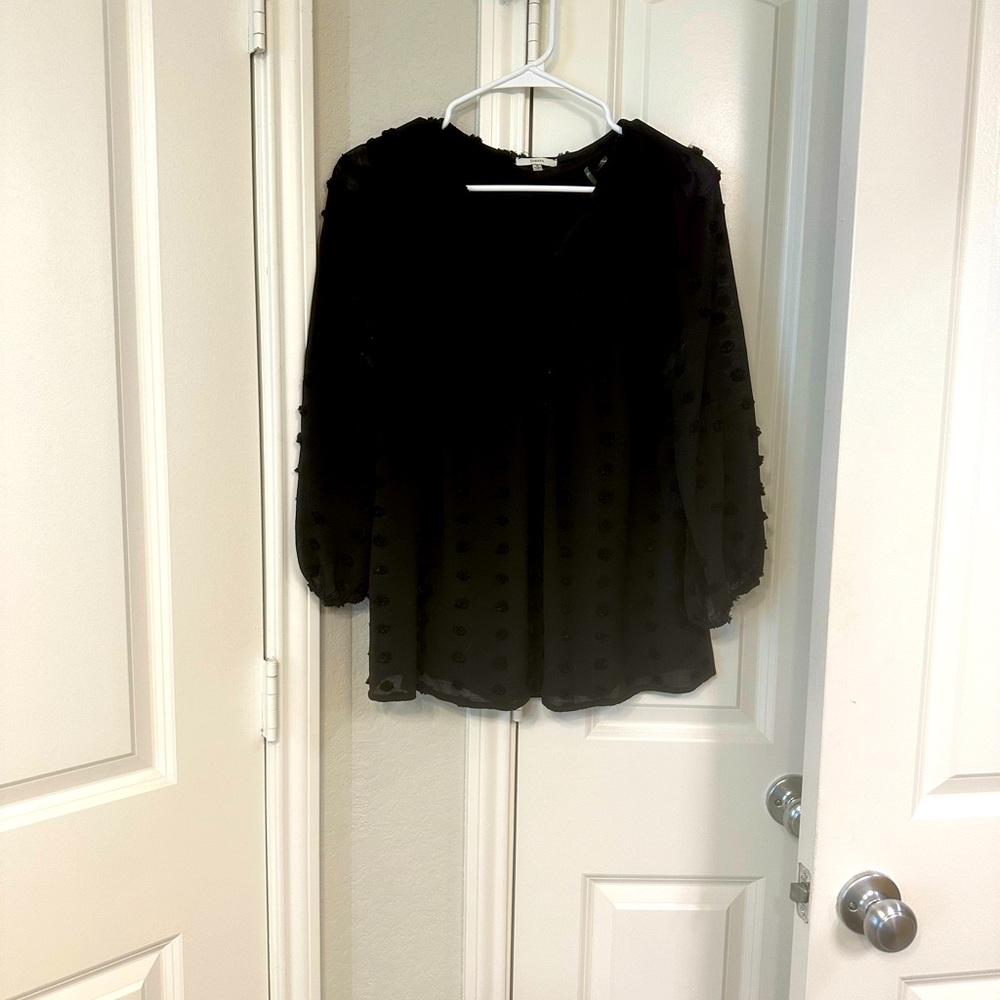 Black polkadot shirt